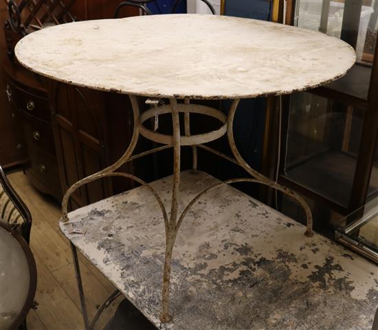 A large painted circular metal French table W.110cm
